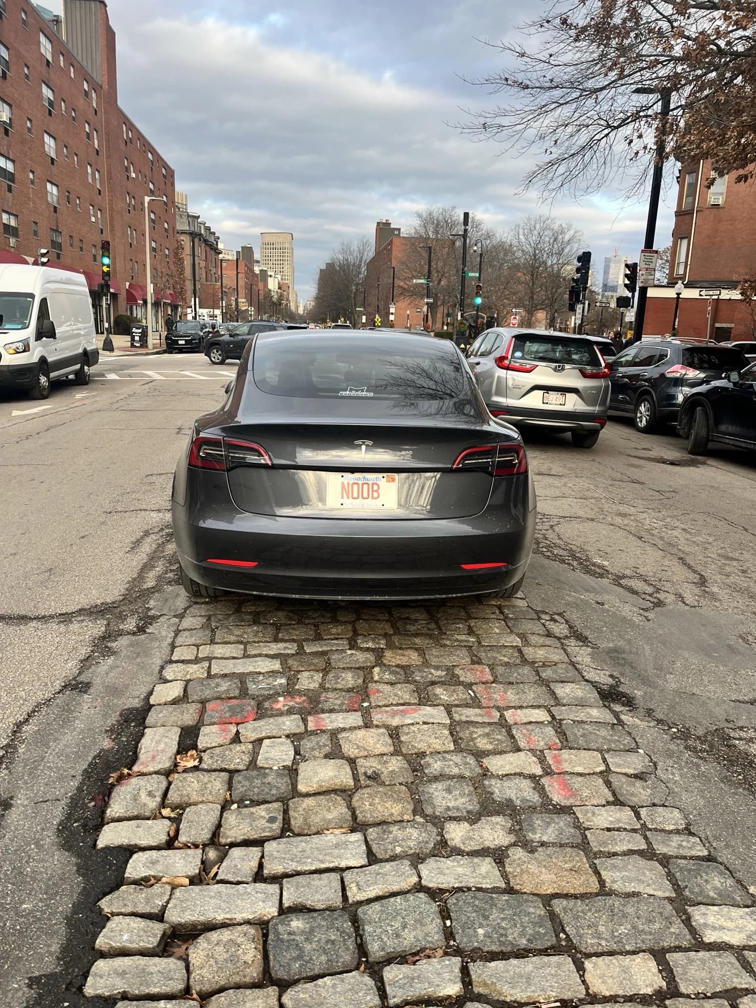 Tesla Model 3 — plate “noob”