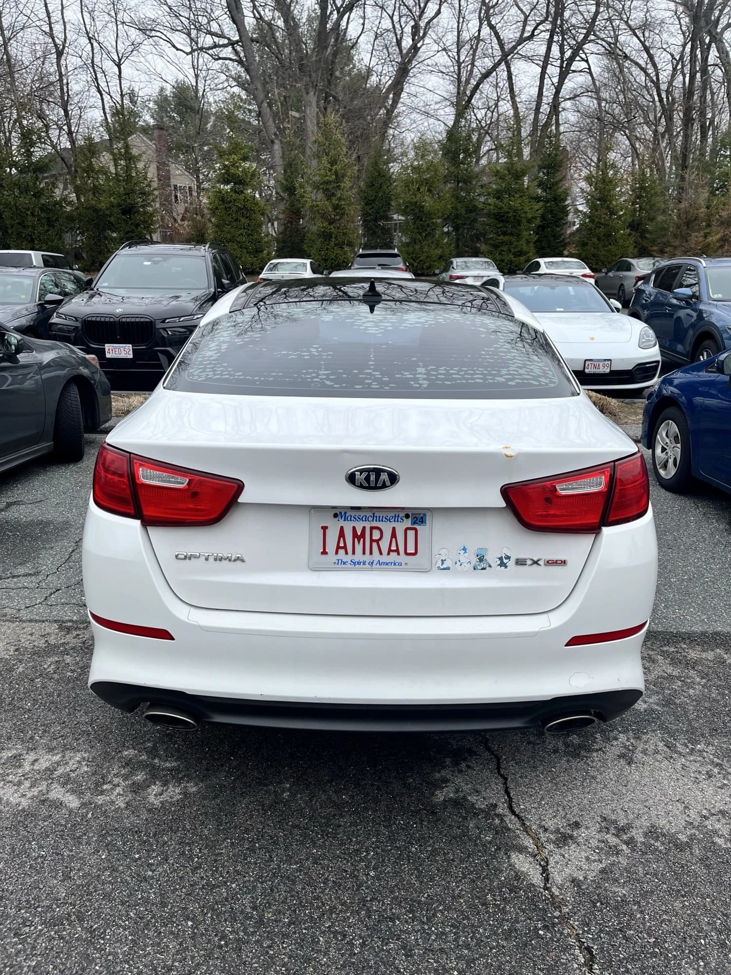 KIA Optima — plate “iamrao”