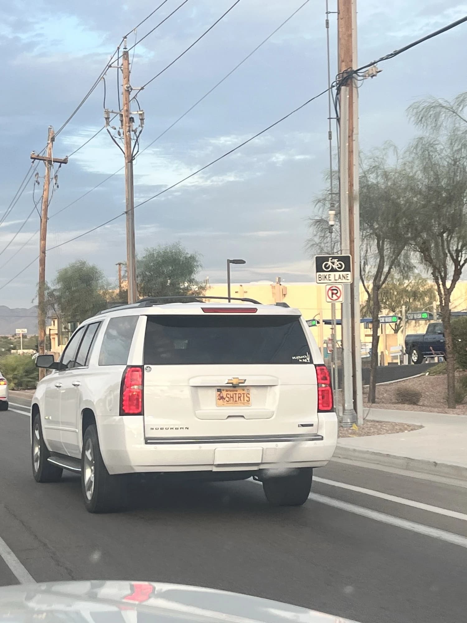 Chevy SubUrban — plate “SHIRTS”