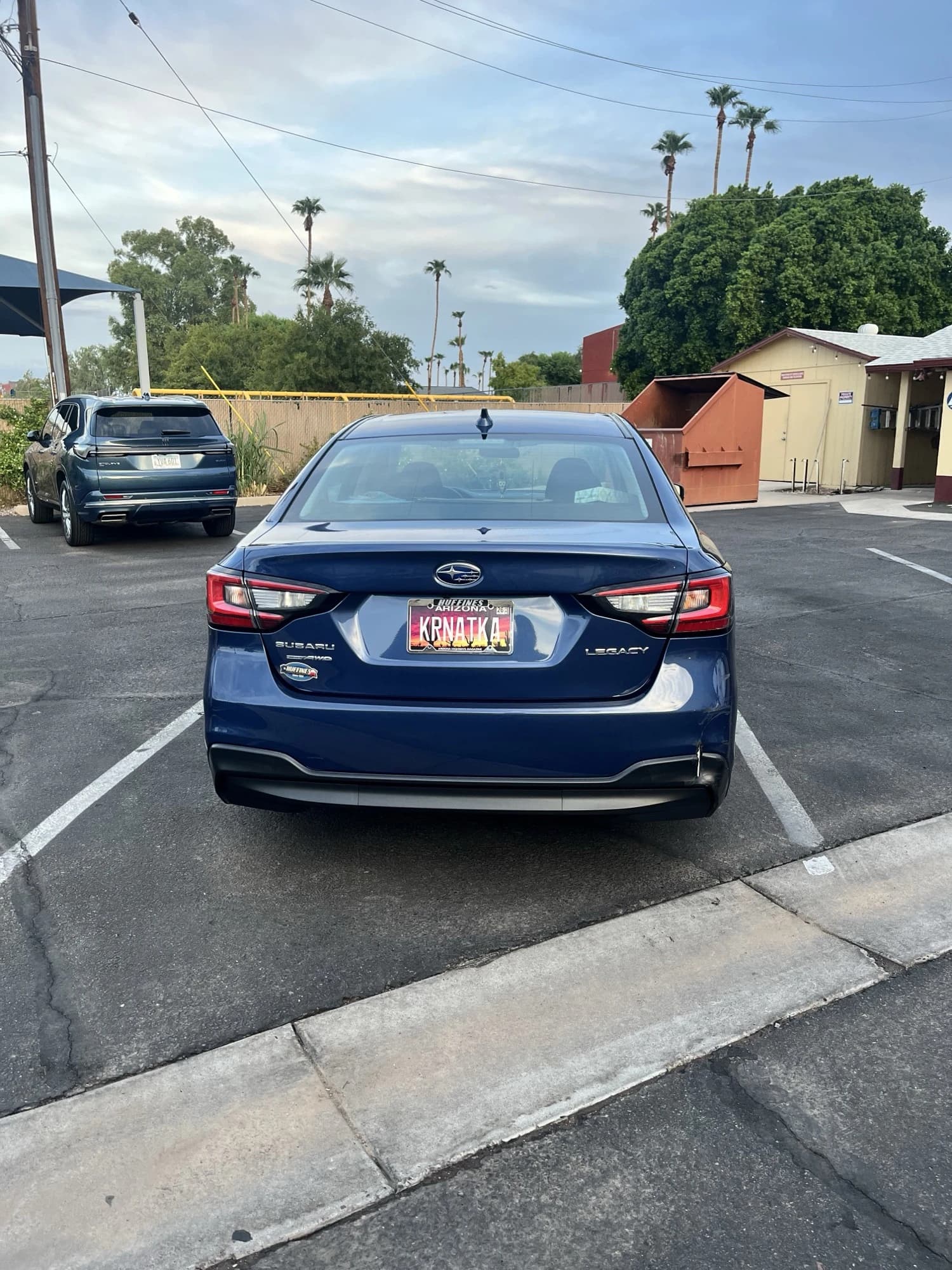 Subaru Legacy — plate “krnataka”