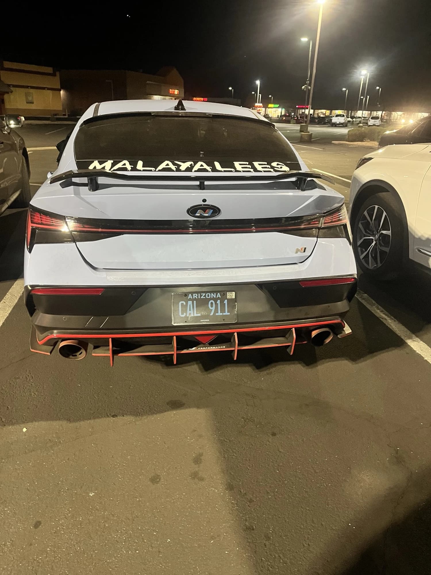 Elantra — plate “CAL911”