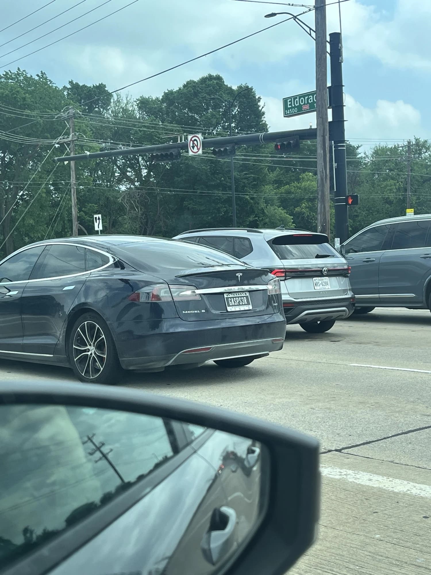 Tesla Model S — plate “GASPS3R”